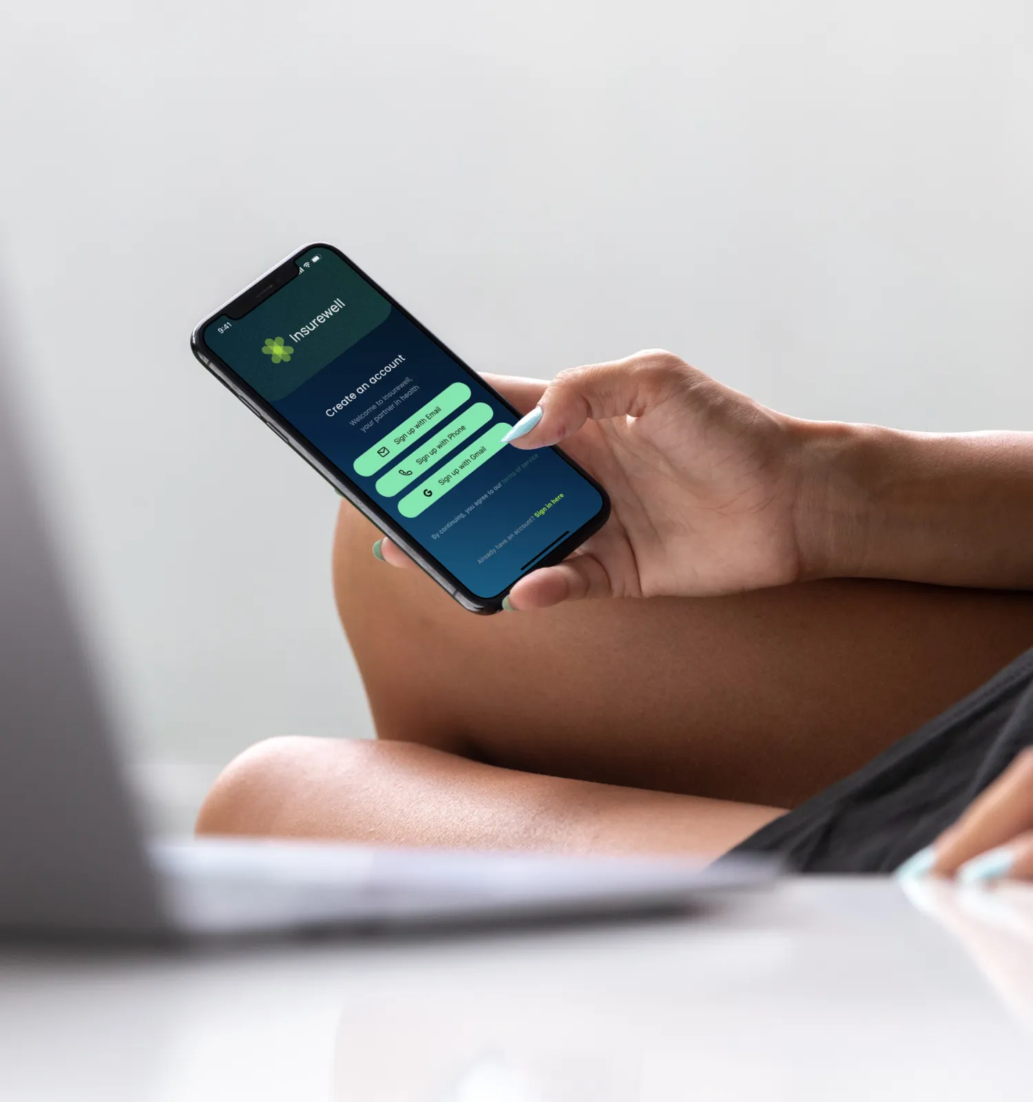 InsureWell app login screen.